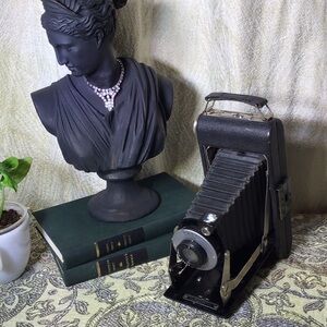 Vintage bellows camera folding Kodak vigilant junior with original booklet